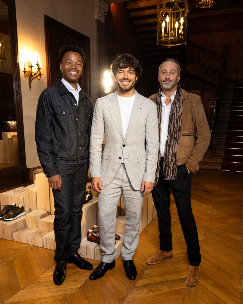 Noah Deric, Nicolas Baisin et Tristan Noumea au cocktail Berluti lors de la Fashion Week homme printemps-été 2025 de Paris.