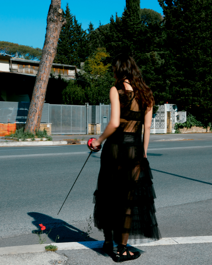 L'escrimeuse Rossela Fiamingo en robe Dior. Portrait par David Paige.