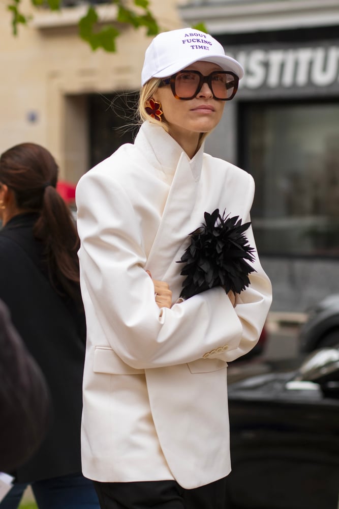 Street style à la Fashion Week printemps-été 2025 © Nathan Merchadier.