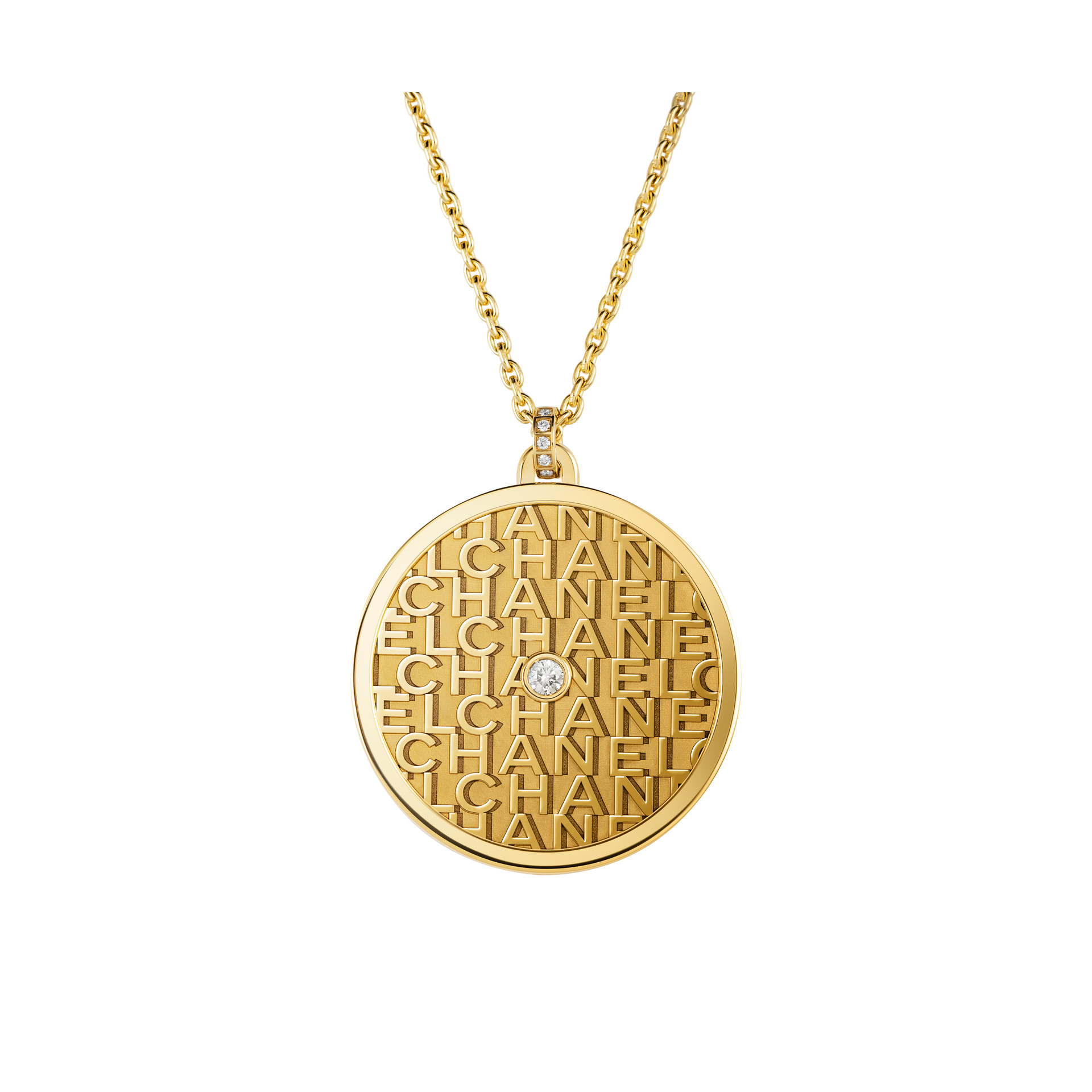 médaille en or et diamant chanel