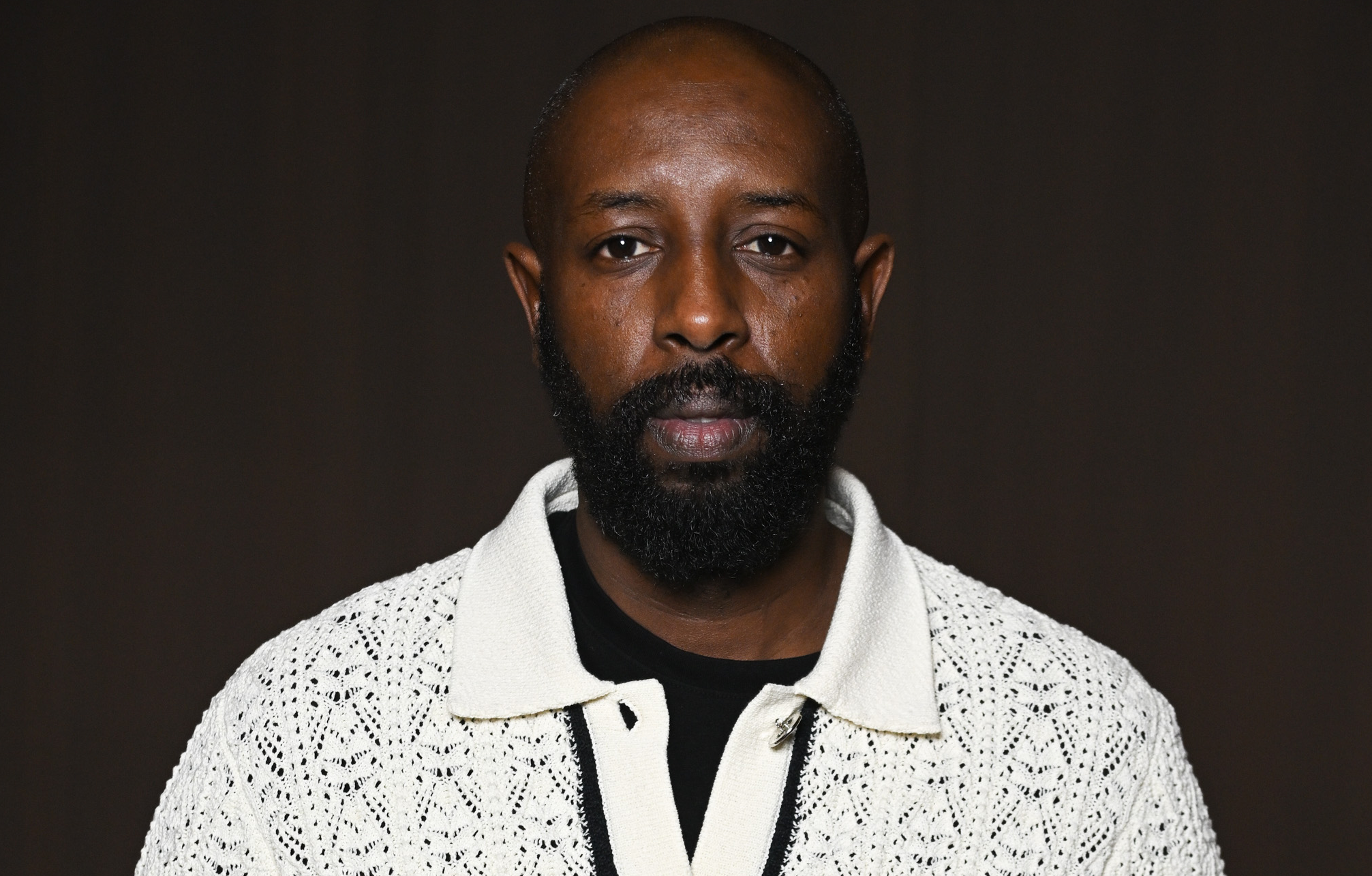 Ladj Ly au défilé Chanel haute couture printemps-été 2024, pendant la Fashion Week de Paris, le 23 janvier 2024. © Stephane Cardinale - Corbis/Corbis via Getty Images. dumas - diable noir