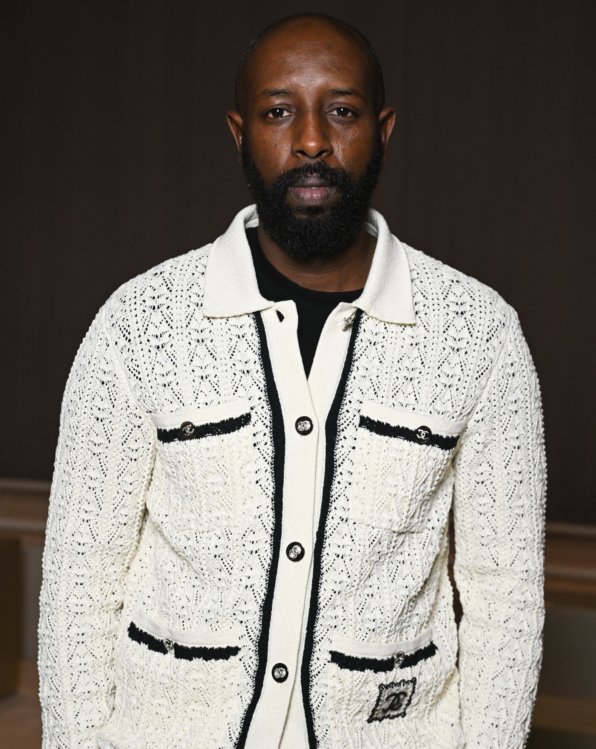 Ladj Ly au défilé Chanel haute couture printemps-été 2024, pendant la Fashion Week de Paris, le 23 janvier 2024. © Stephane Cardinale - Corbis/Corbis via Getty Images. dumas - diable noir