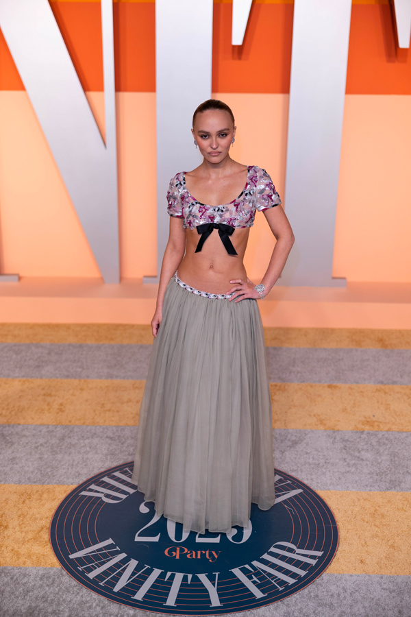 Lily-rose depp wearing a crop top and Chanel skirt for the Vanity Fair party at the Academy Awards in 2025
