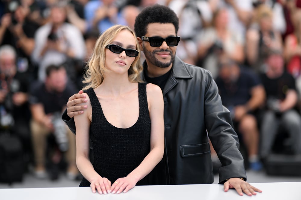 Lily-Rose Depp et Abel 'The Weeknd' Tesfaye au photocall de The Idol lors du 76ème festival de Cannes au Palais des Festivals le 23 mai 2023 à Cannes, France © Stephane Cardinale - Corbis/Corbis via Getty Images.