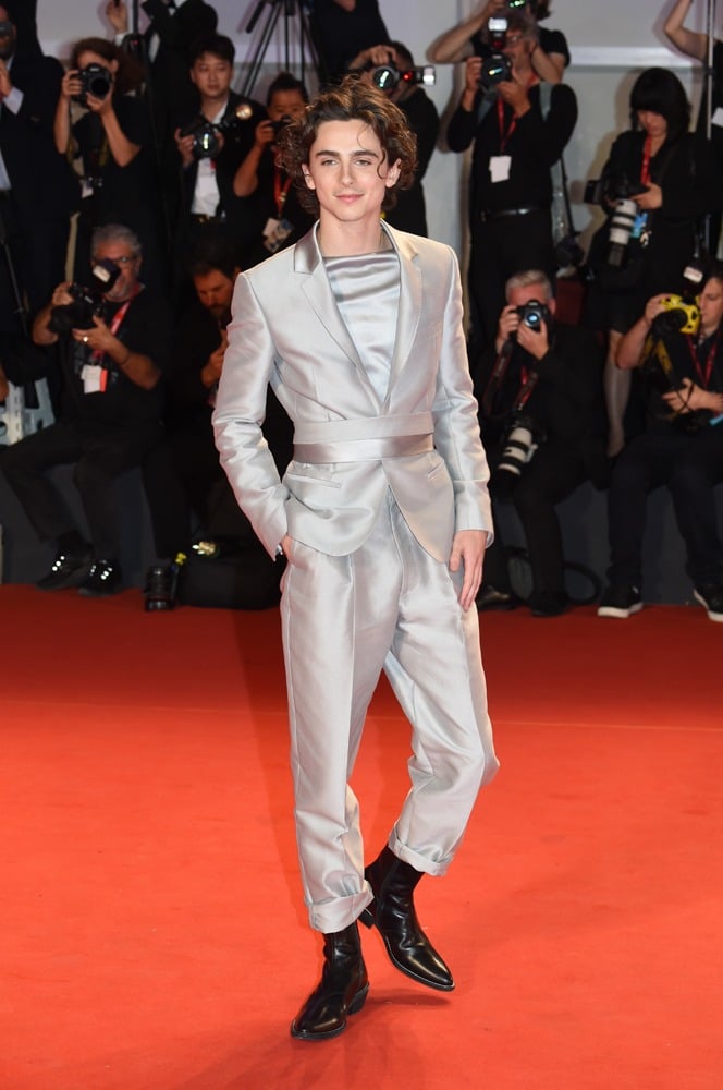 Timothée Chalamet en costume Haider Ackermann à Venise en 2019 © Stephane Cardinale - Corbis/Corbis via Getty Images.