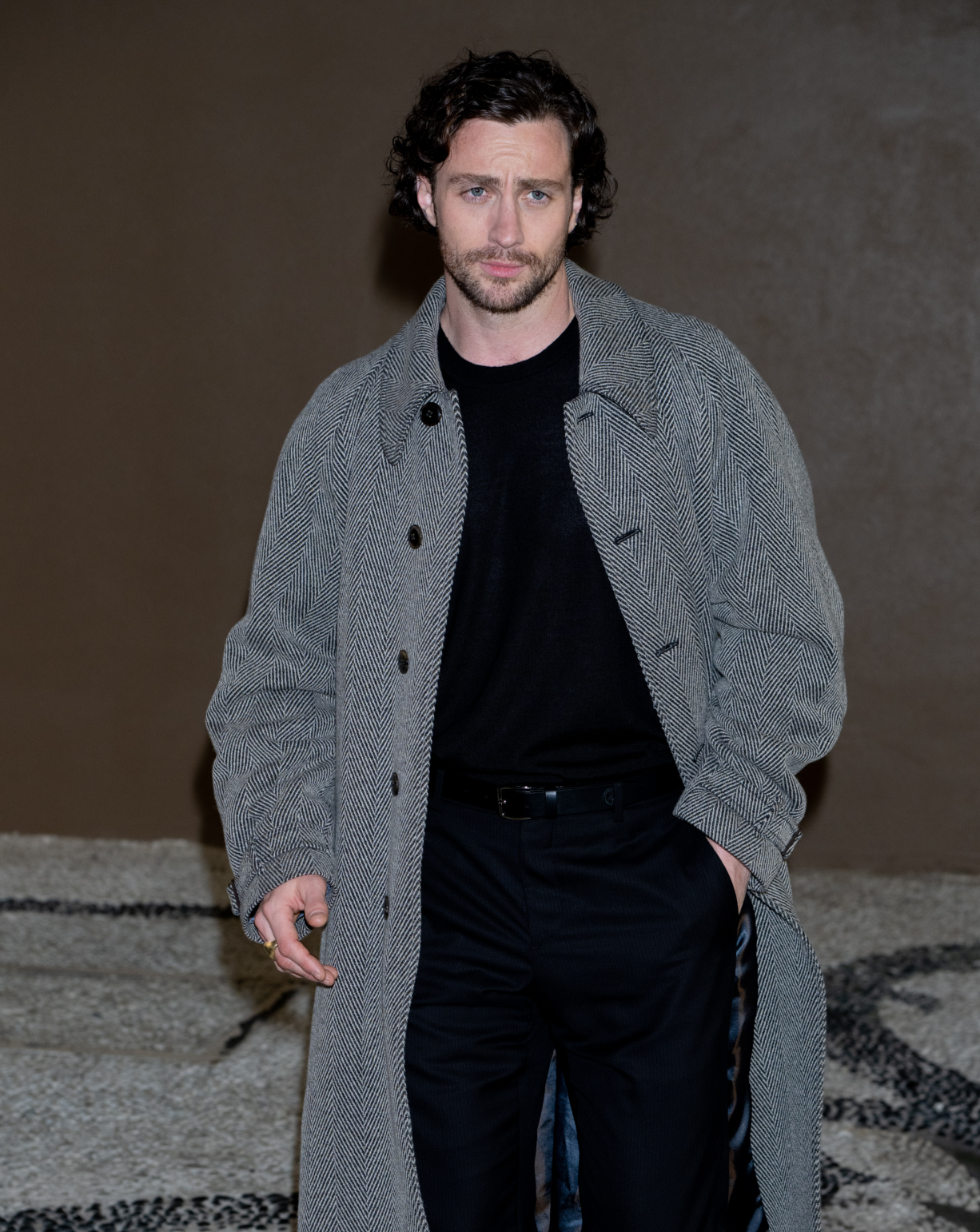 Aaron Taylor-Johnson invité au défilé Giorgio Armani femme automne-hiver 2024-2025 à la Fashion Week de Milan, le 25 février 2024. © Matteo Rossetti/Archivio Matteo Rossetti/Mondadori Portfolio via Getty Images. 28 ans plus tard