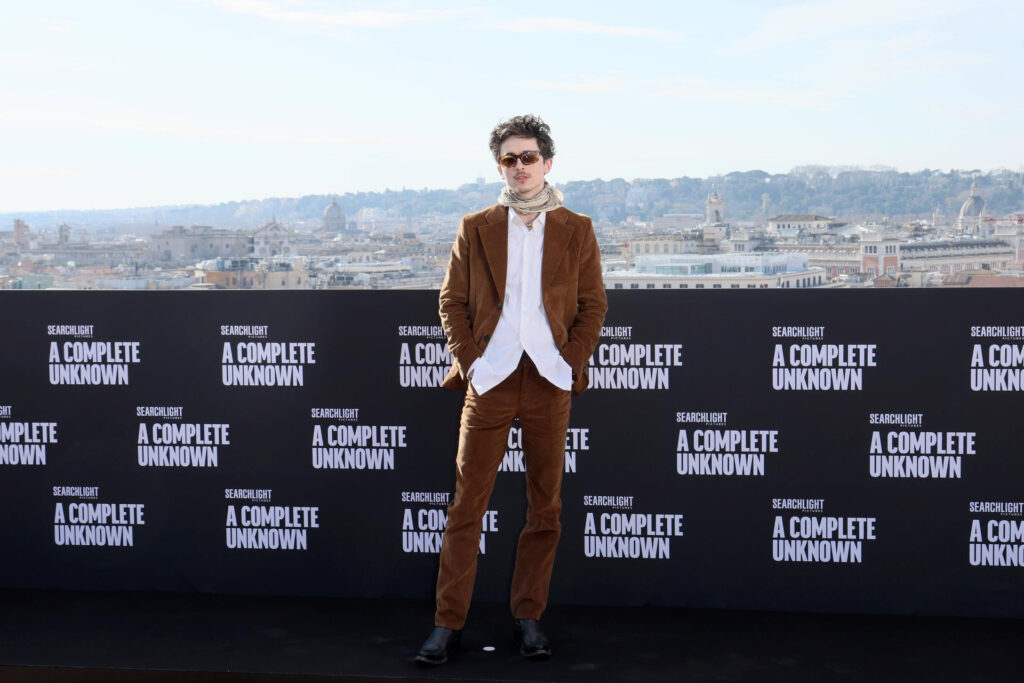 Timothée Chalamet in Prada while attending the "A Complete Unknown" photocall on January 17th, 2025 in Rome.