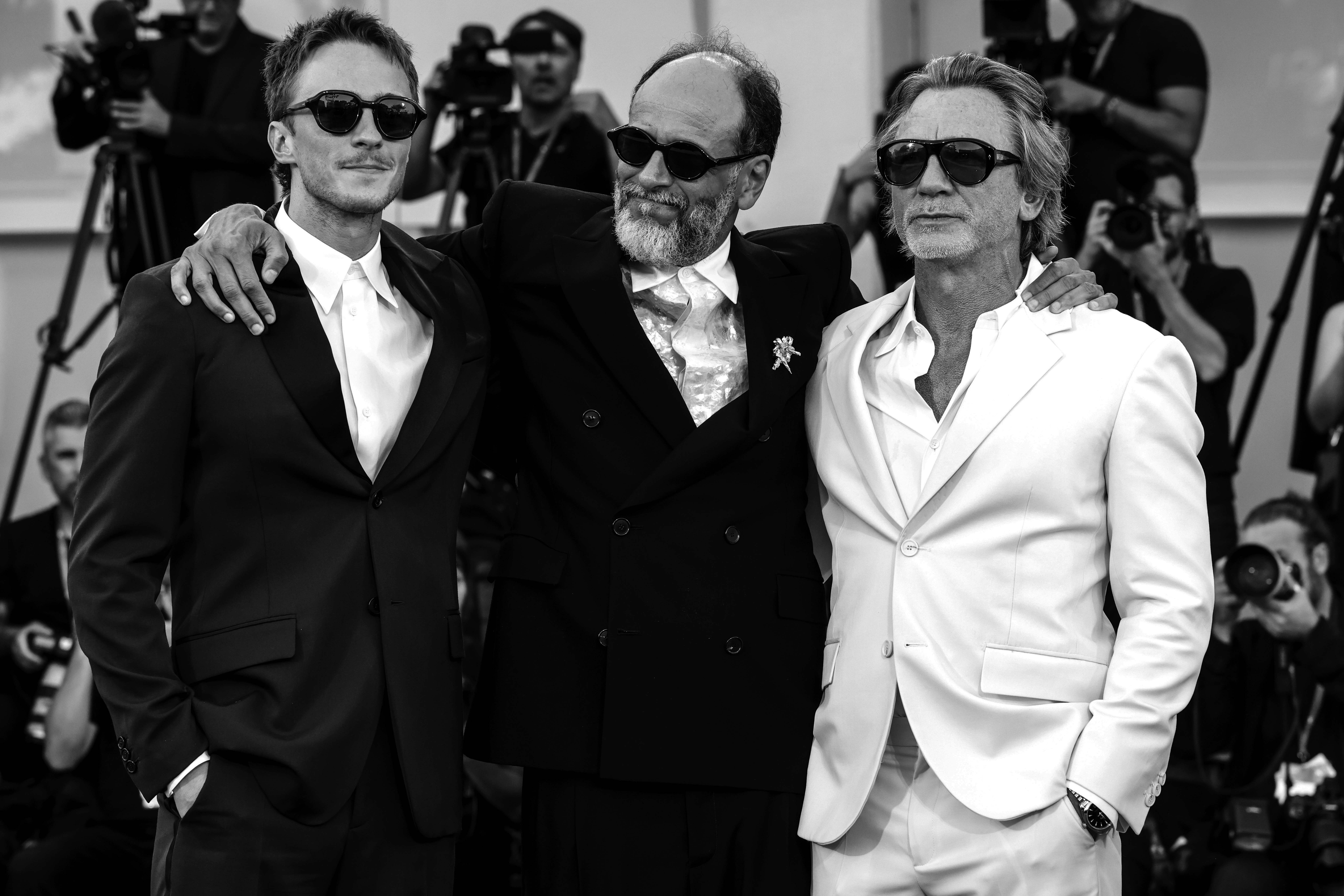 Luca Guadagnino, Daniel Craig et Drew Starkey à la projection de Queer à la Mostra de Venise, le 3 septembre 2024. Photo par Alessandra Benedetti - Corbis/Corbis via Getty Images.