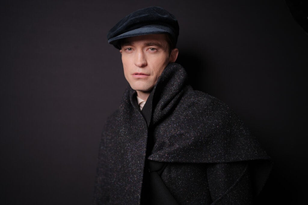 Robert Pattinson au défilé Dior Homme pendant la Fashion Week Homme Automne 2025 à Paris, le 24 janvier 2025.