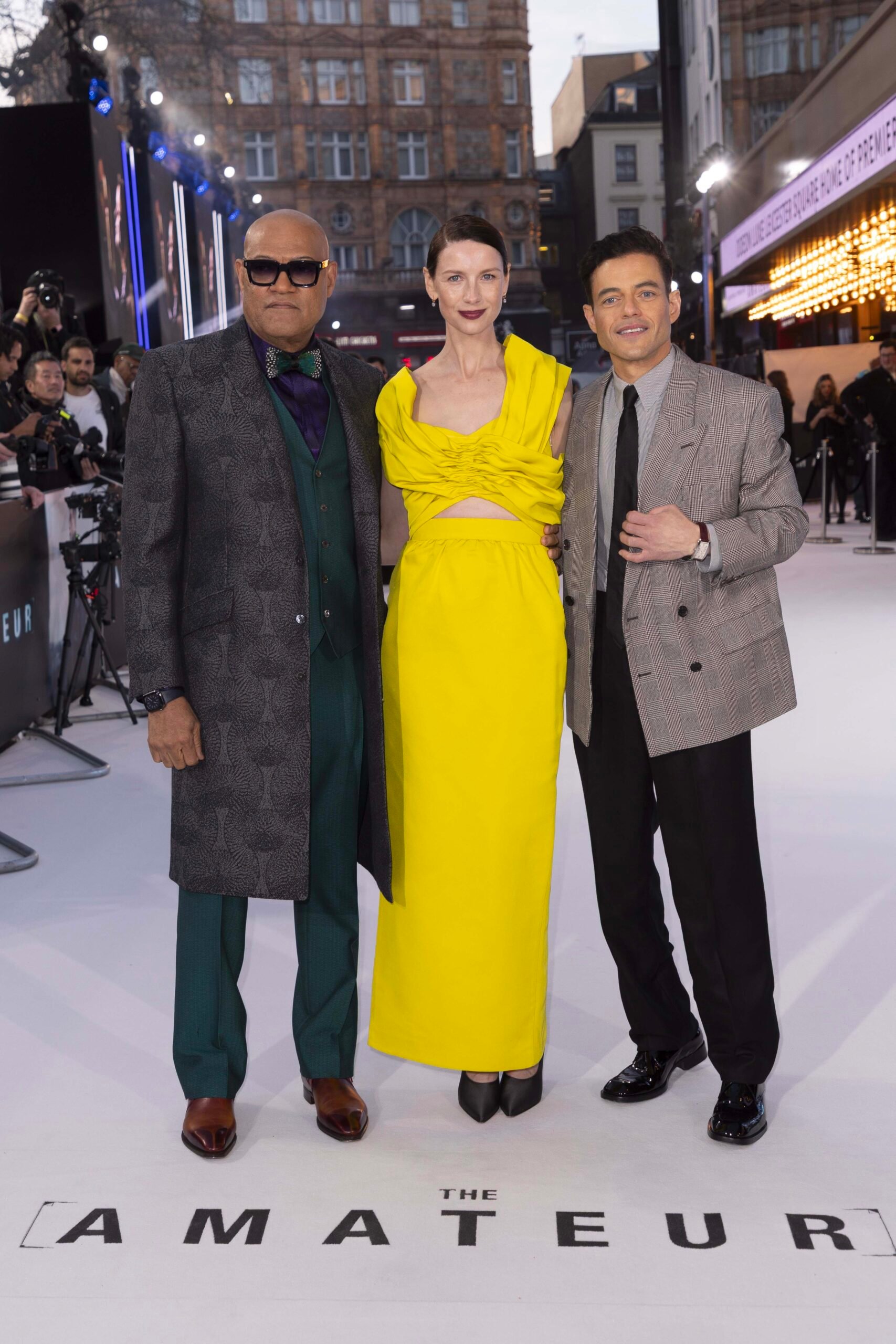 Laurence Fishburne, Rami Malek, and Caitríona Balfe at The Amateur premiere at the Odeon Luxe Leicester Square in London, March 31, 2025. Photo by StillMoving.Net for The Walt Disney Company Limited.