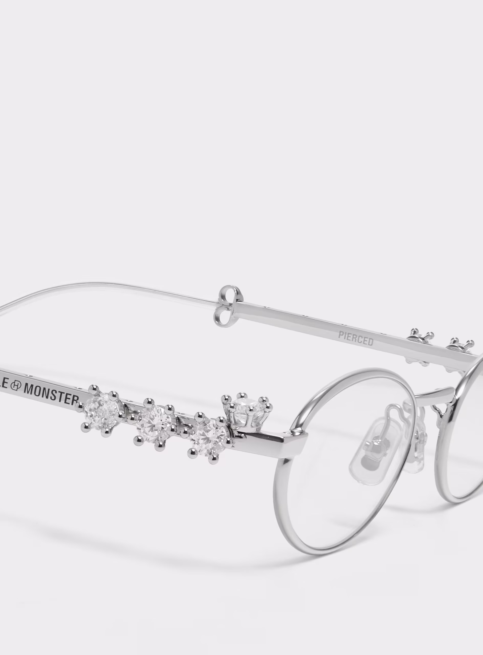 Pierced 02 glasses with D’heygere.