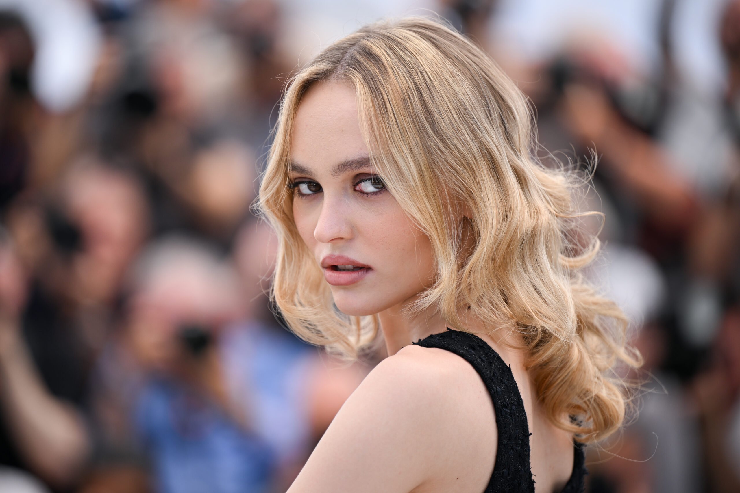 Actress Lily-Rose Depp at The Idol photocall during the 76th edition of the Cannes Film Festival, at the Palais des Festivals in Cannes, France, on May 23, 2023. (Photo by Stephane Cardinale – Corbis/Corbis via Getty Images).