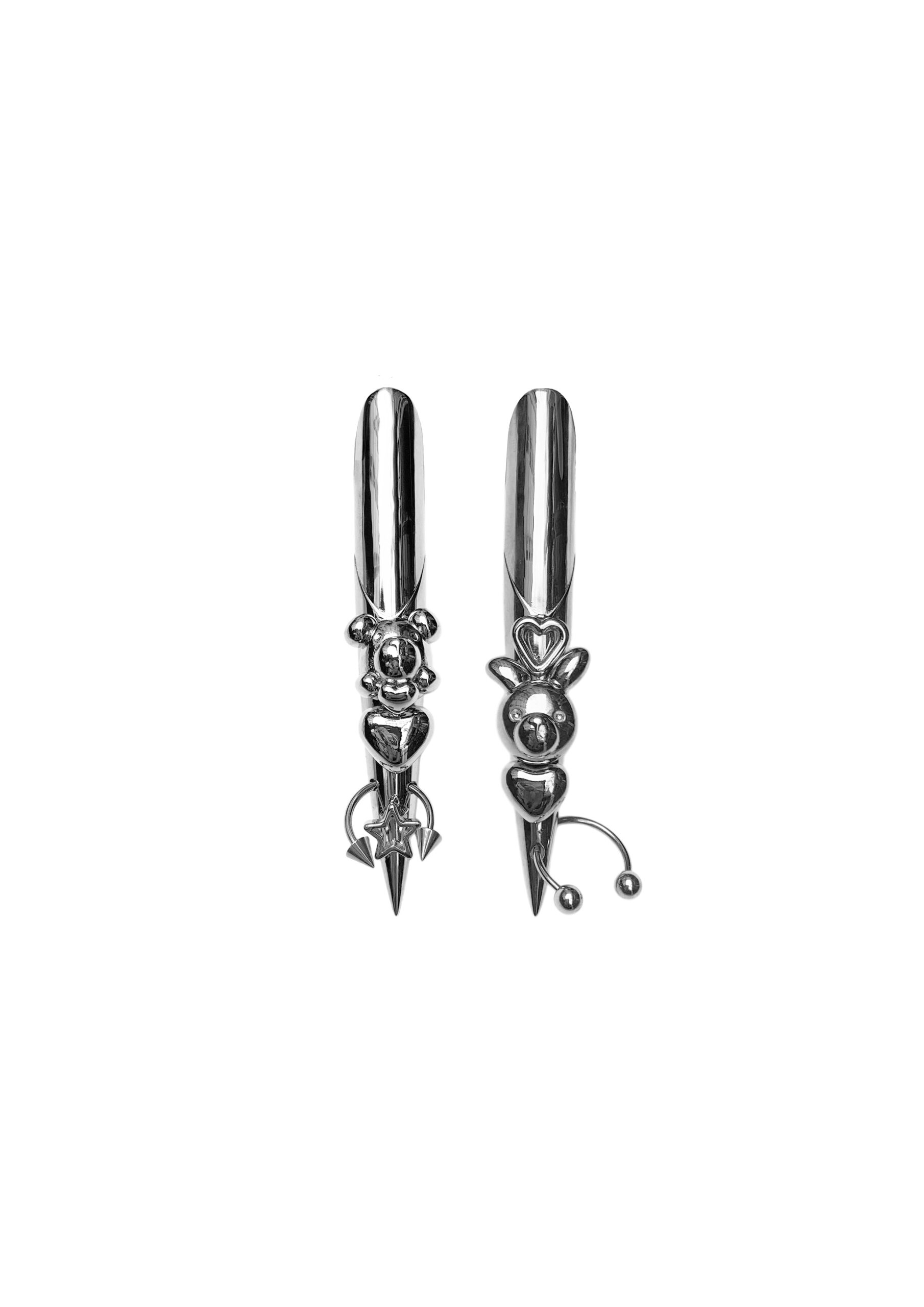 boucles d'oreille en forme d'ongles stiletto d'heygere