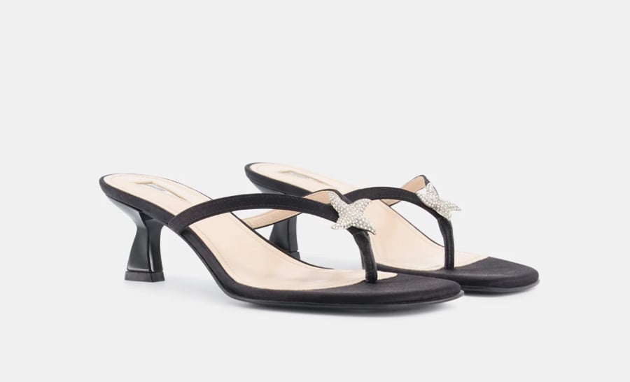 Nodaleto black satin, heeled thong sandal with rhinestones.