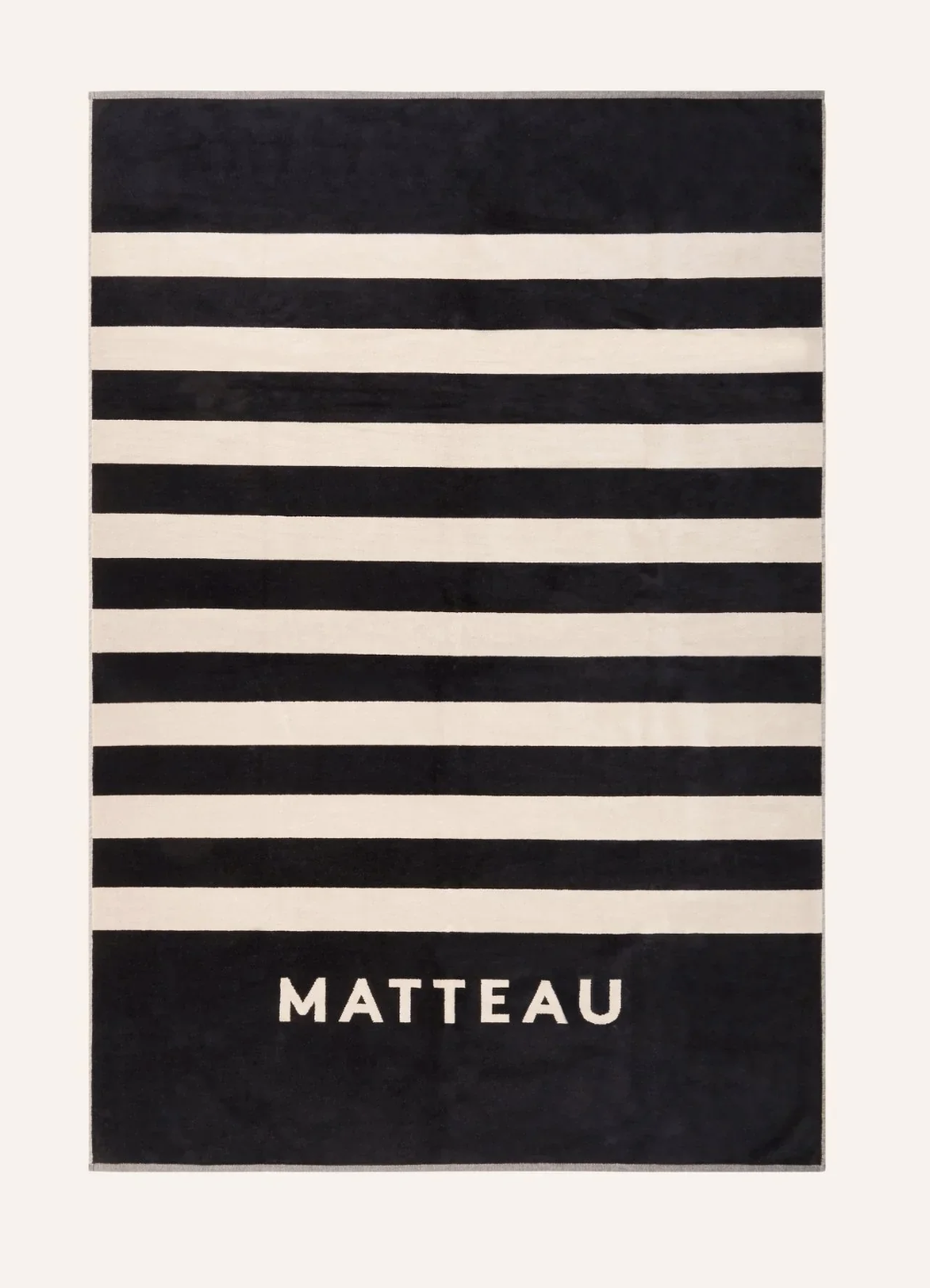serviette de plage à rayures matteau été 2025