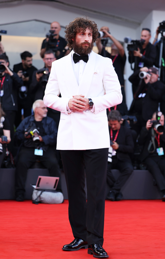Aaron Taylor-Johnson wearing a giorgio armani suit and omega watch at the 2025 Venice Film Festival