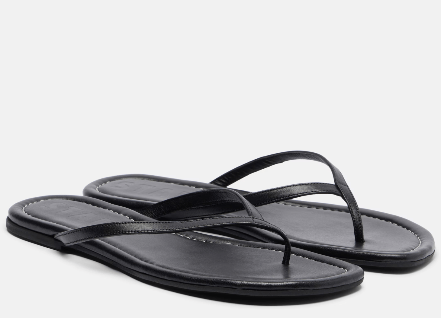 tongs en cuir noir tendance printemps-ete 2026 staud