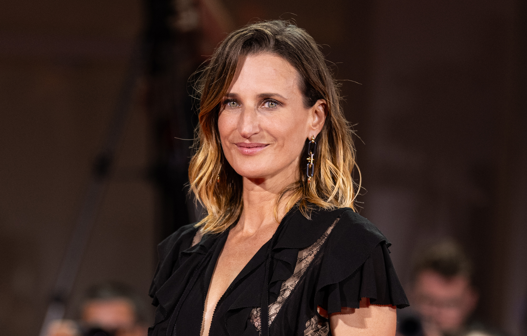 Photo de l'actrice Camille Cottin à la présentation du film Trois amies lors de la Mostra de Venise 2024.