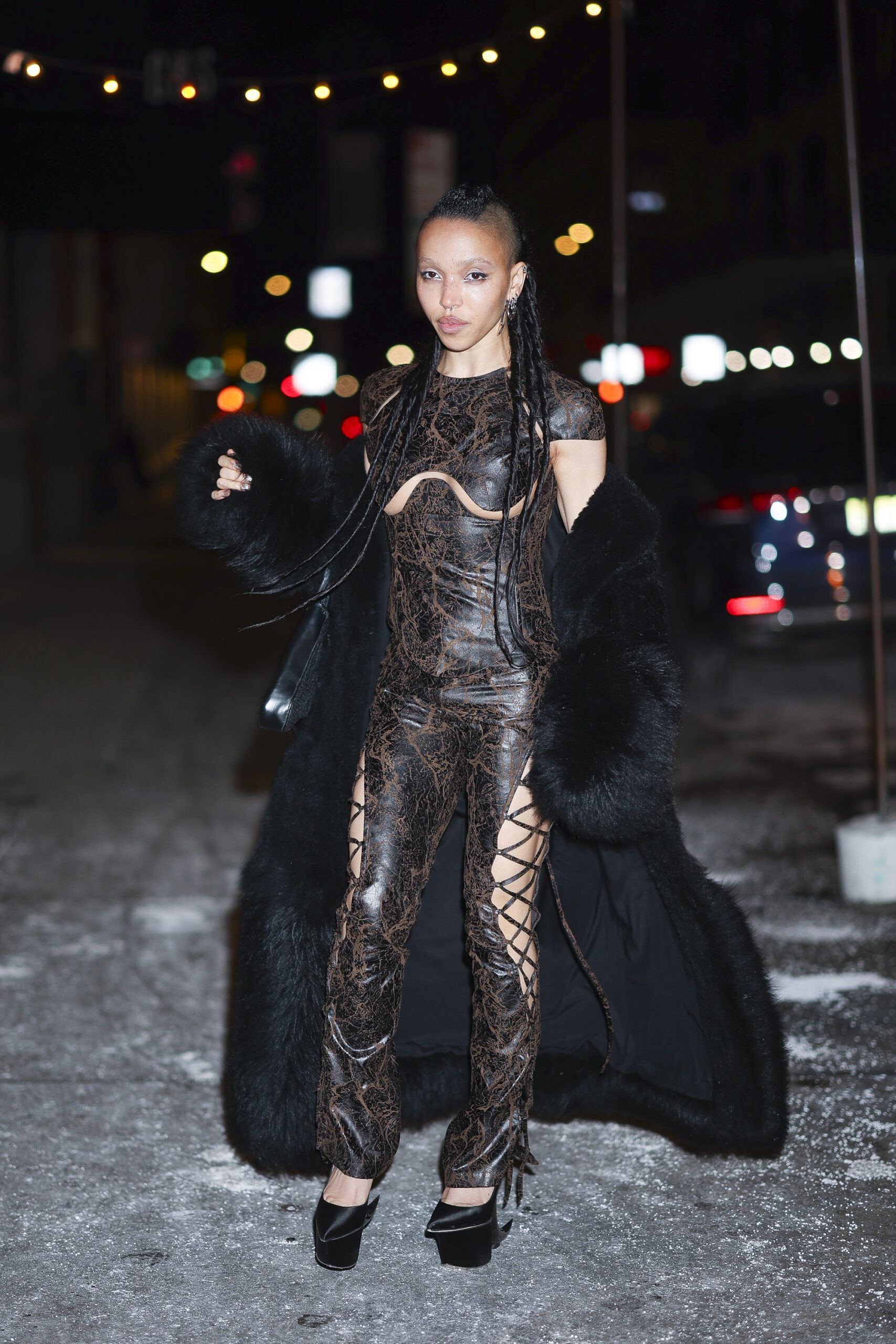 FKA twigs wearing a fur coat with a leather jumpsuit in New York in 2025 © Aeon/GC Images.