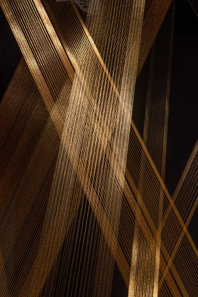 Lygia Pape, Ttéia 1, C (2003-2025). Courtesy Projeto Lygia Pape. <br>View of the exhibition “Lygia Pape. Tisser l’espace”, Bourse de commerce – Pinault Collection, Paris, 2025. © Tadao Ando Architect & Associates, Niney and Marca Architectes, Pierre-Antoine Gatier agency. Photo: Nicolas Brasseur / Pinault Collection.