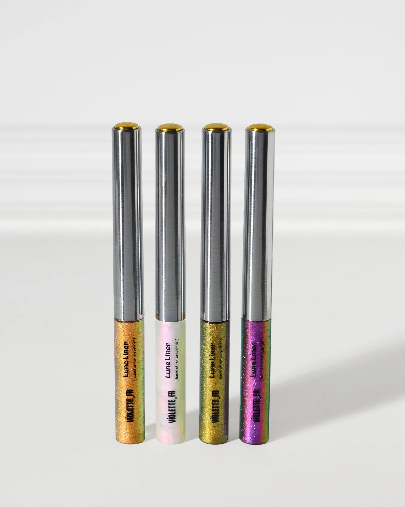 Liquid Chrome Eyeliner, Violette.
Longwear liquid multichrome eyliners, €40 each. Available on Violette.