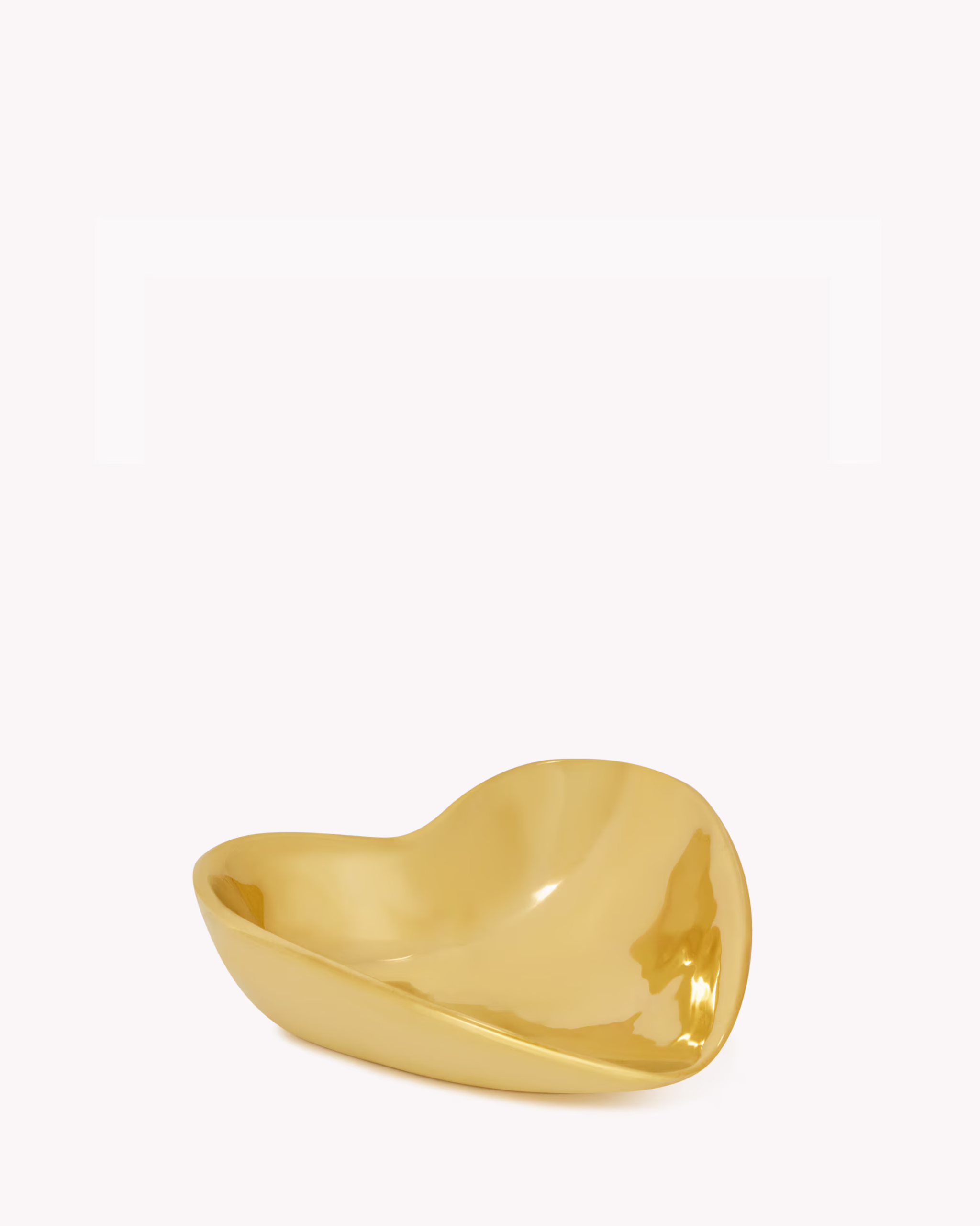Vide-poche cœur en laiton, 650 €, Saint Laurent.