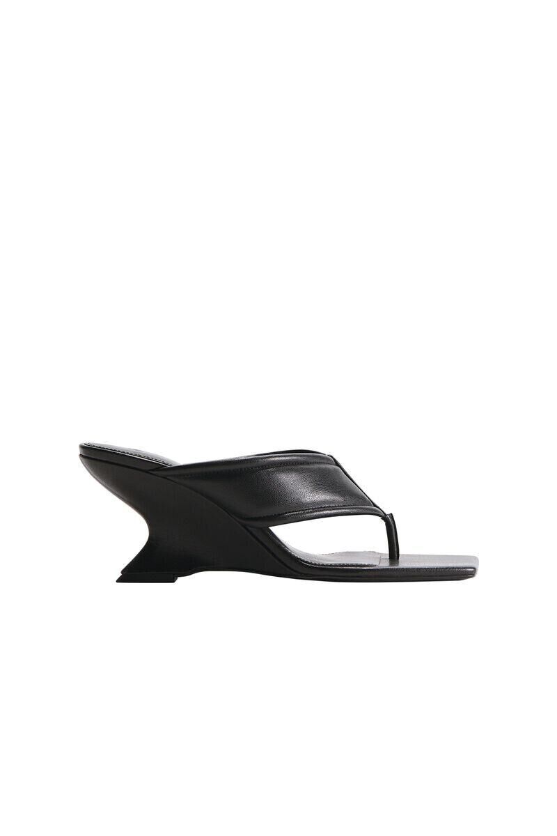 H&M Les tongs à talon sculpture.