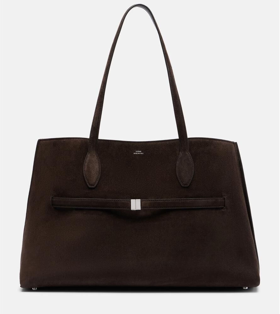 Sac cabas Lounge, Toteme.
En daim marron, 1 390 €.