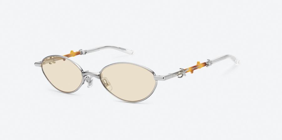 lunettes de soleil ovales à monture métallique tendance printemps-ete 2026 gentle monster
