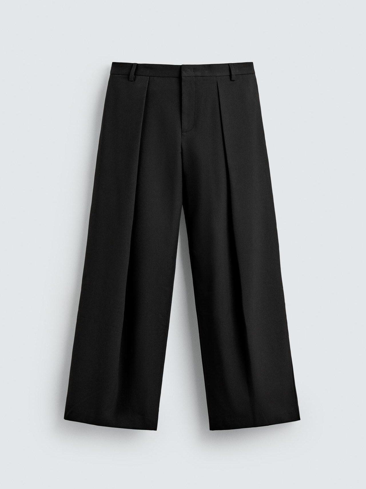 Pantalon à plis, 49€, Zara.