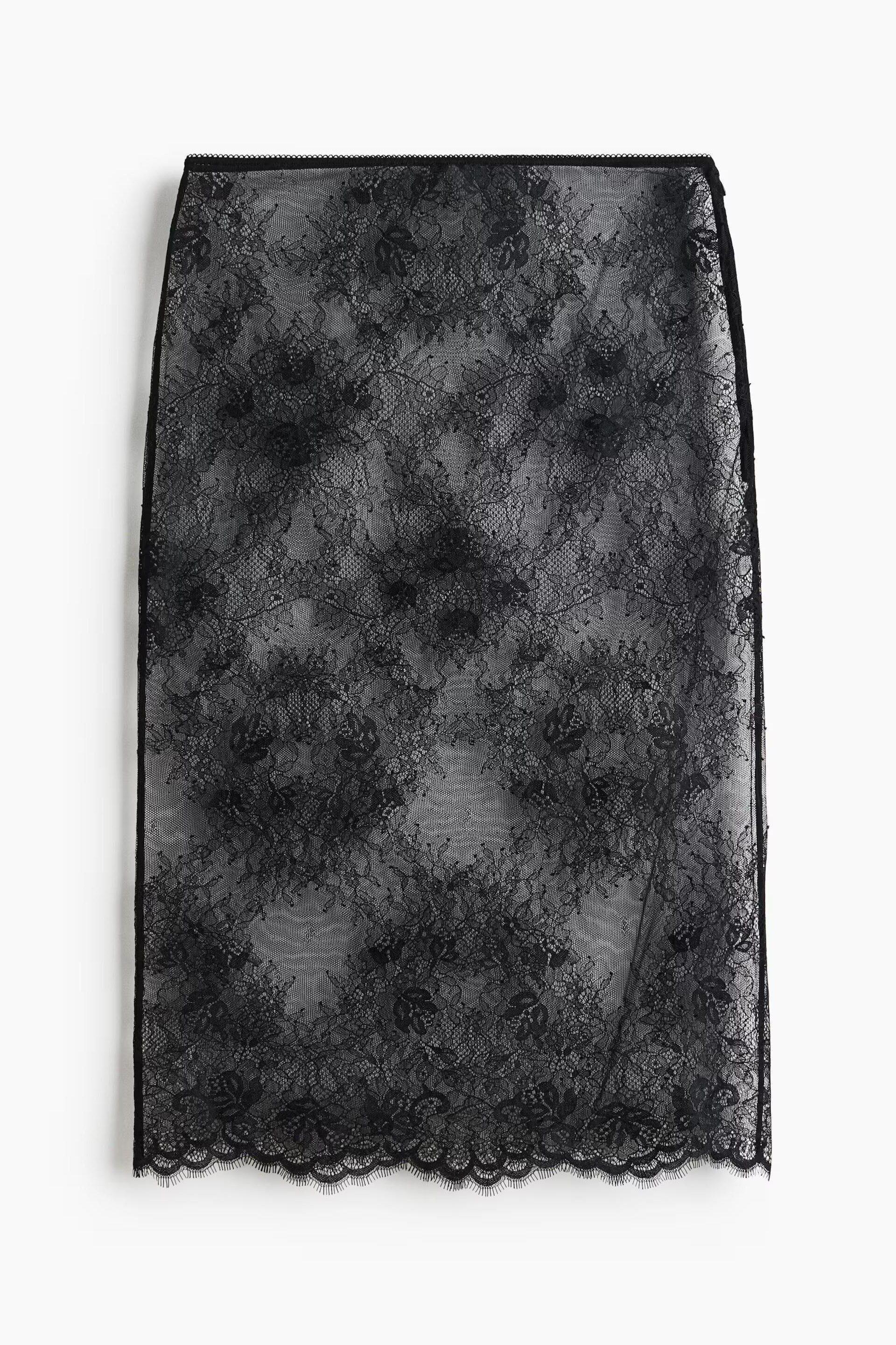 Jupe midi en dentelle noire transparente, 29,99 €, H&M.