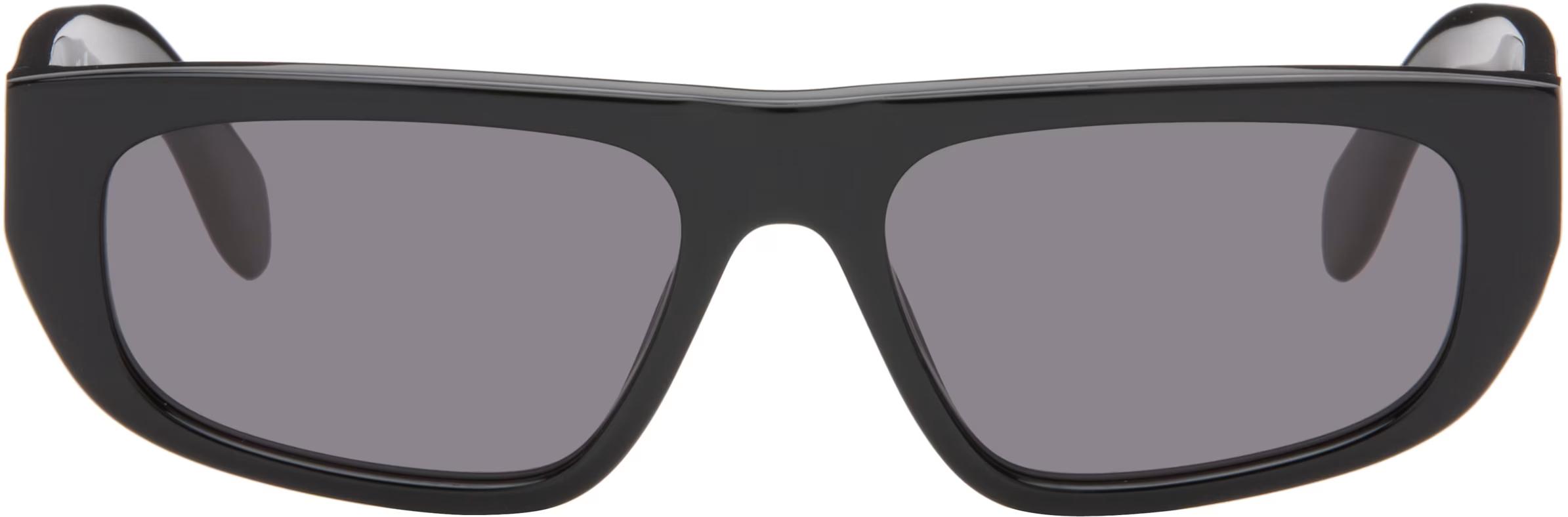 Lunettes de soleil, 340€, Palm Angels.