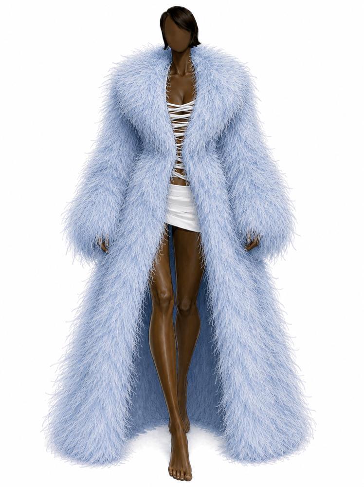 Le manteau de plumes bleu Yves Salomon porté par Aya Nakamura pour son concert au Stade de France en 2026.