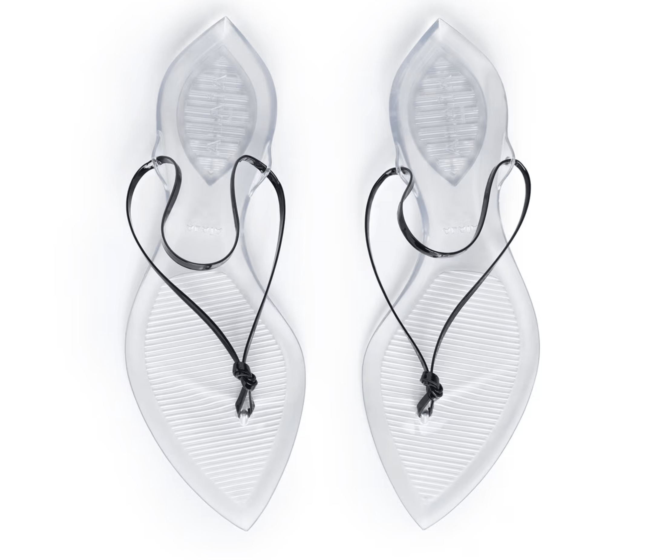 Tongs invisibles en cuir verni, Alaïa.